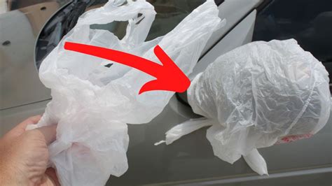 covering bag over car mirror.